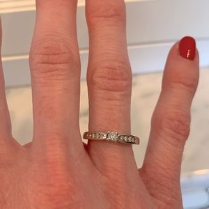 Perfect condition 10k white gold ring with 1/5cw certified diamonds.